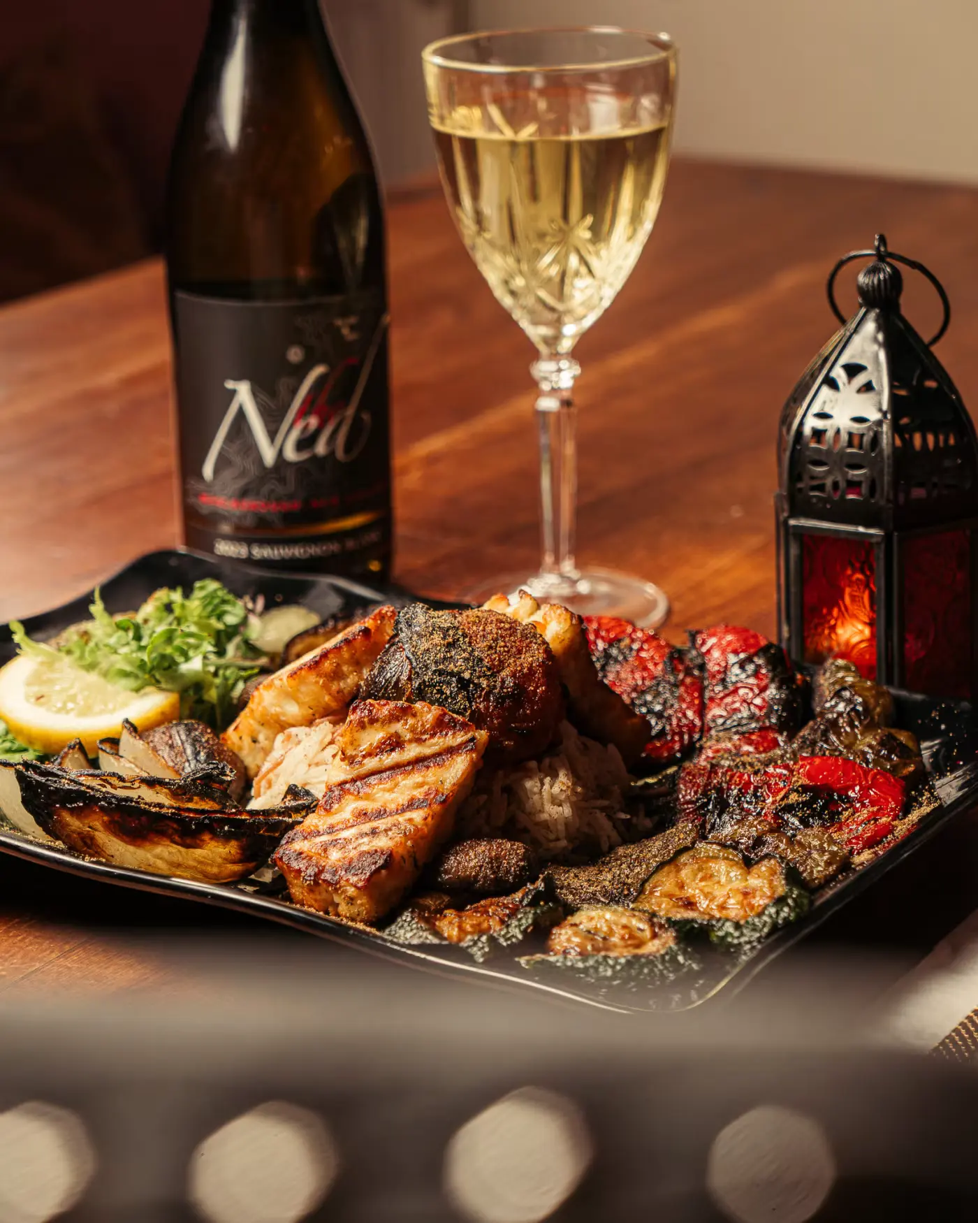 Mixed grill platter with white wine and a Moroccan lantern at Beirut Restaurant, Edinburgh, food photography by Gorka Di Capitan (gorkadicapitan.com)